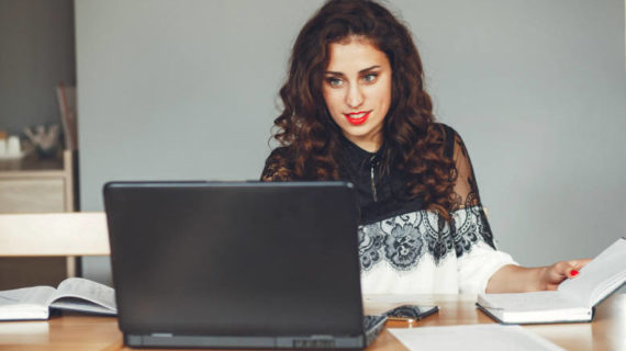 woman busy working on her laptop