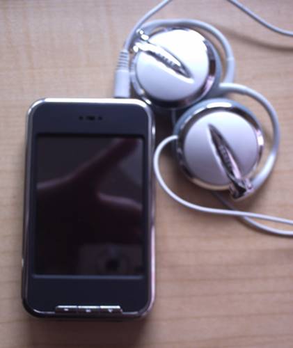 mobile phone and headset on the table