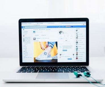 Facebook page on laptop screen