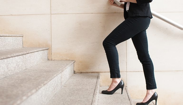 woman taking the stairs