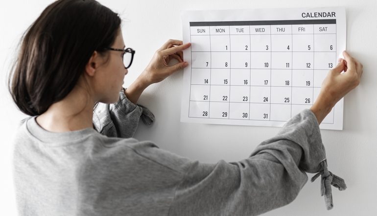 woman checking the calendar