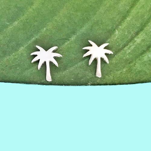 product photo of a palm tree design earing