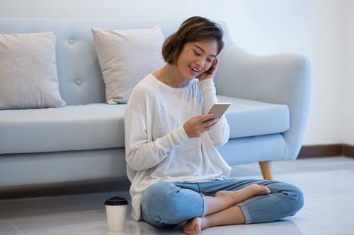 woman using her mobile phone