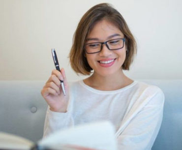 happy woman reading book