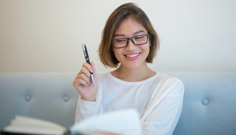 happy woman reading book