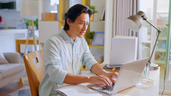 asian man working from home
