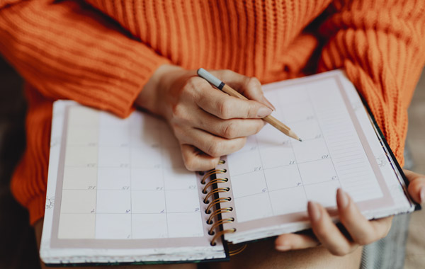 woman checking her calendar