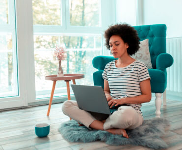 female freelancer working remotely from home