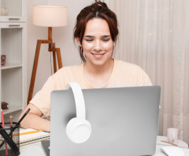 Front view of woman working at desk