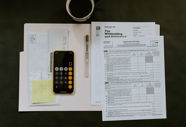 tax paper and calculator on the table