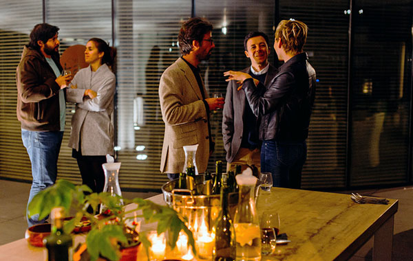 five person standing while talking