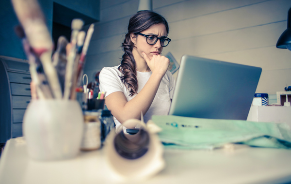 woman thinking while working