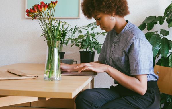 woman using her tablet