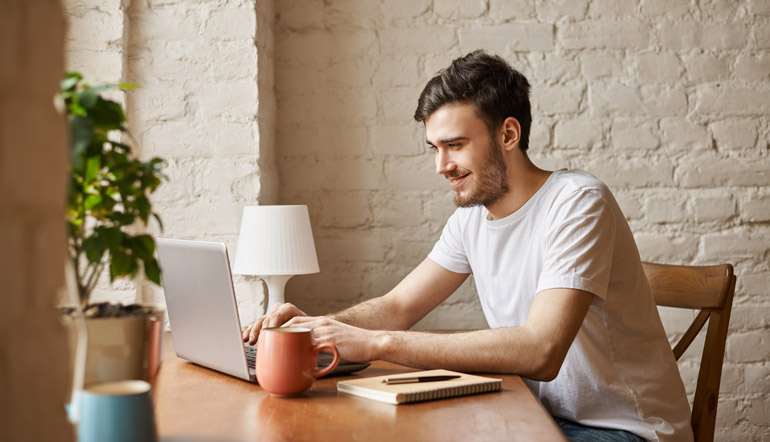 man using laptop