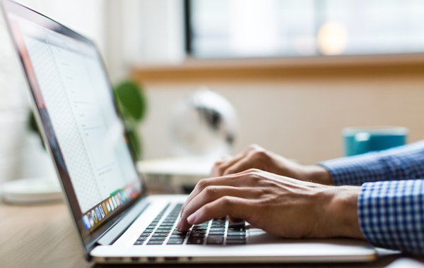 Person using Macbook