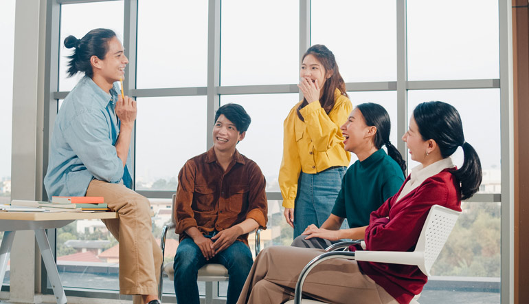 Group of young college students in smart casual wear