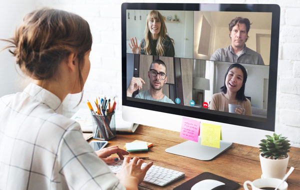 woman attending virtual meeting