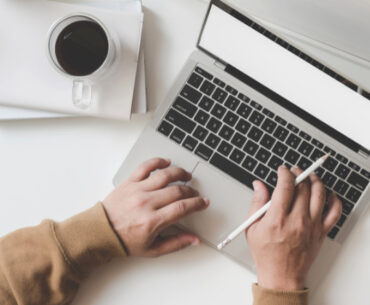 adult woman working using her laptop