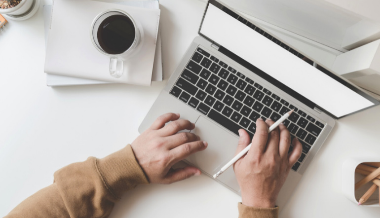 adult woman working using her laptop