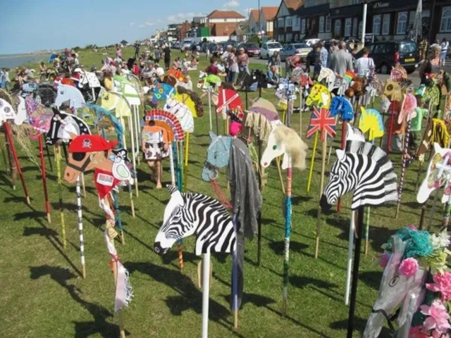 hobby horses on a lawn