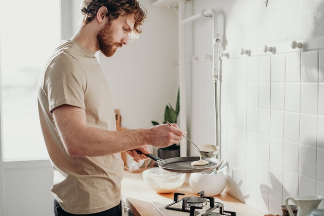 man in the kitchen cooking