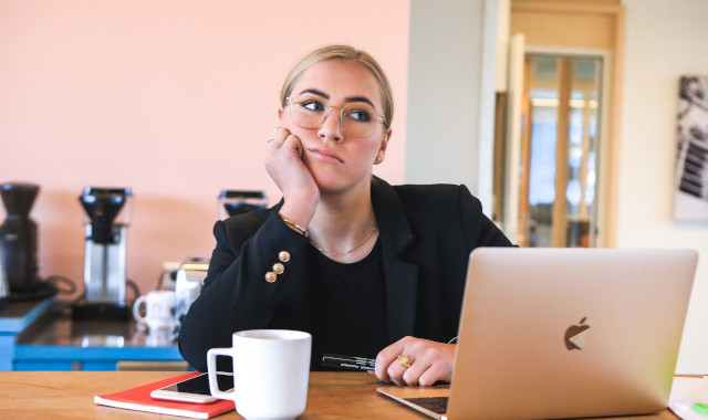 woman bored in office