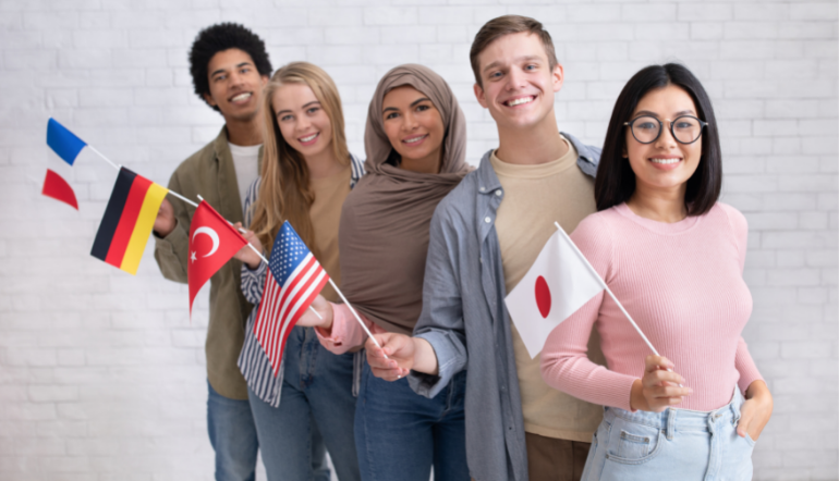 young adults holding different flags
