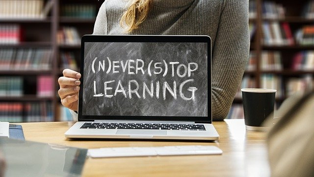 laptop written (N)EVER (S)TOP LEARNING