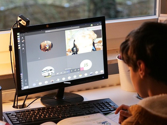 student studying using a laptop