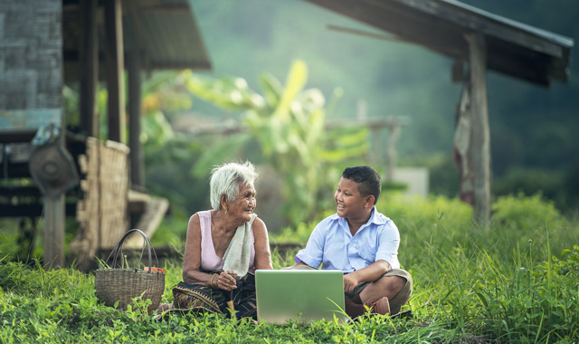 grandmother talking to her grandchild