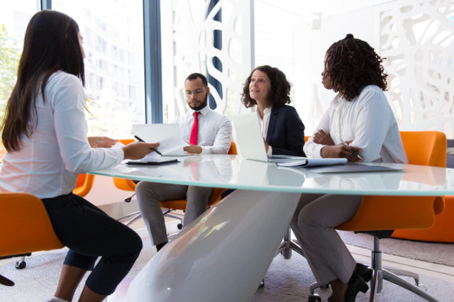 hiring team interviewing a job candidate