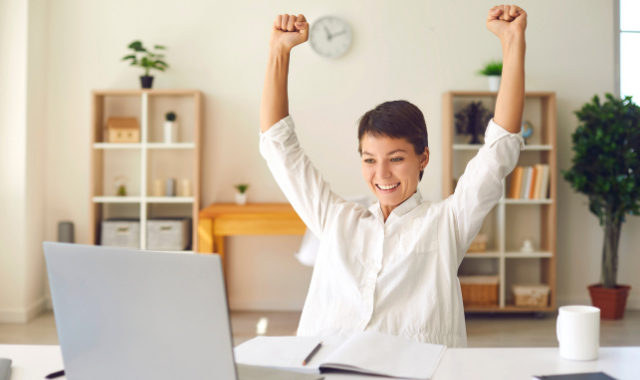 woman celebrating her success