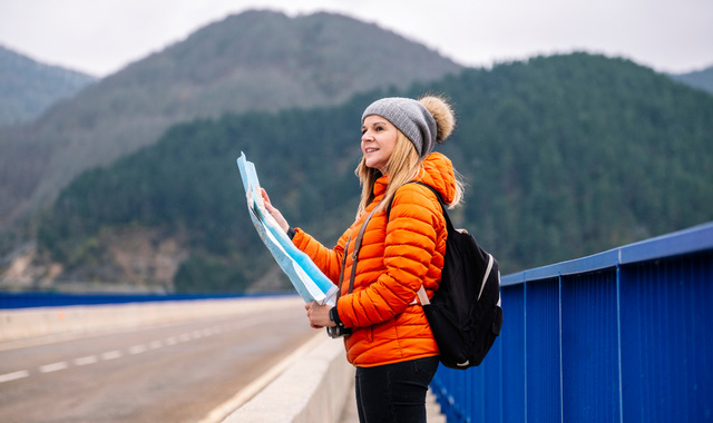 woman holding a map