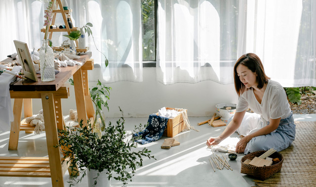 asian woman making crafts