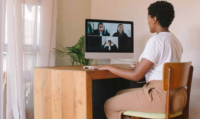 woman having virtual meeting at home