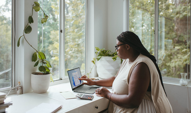 woman working at a laptop