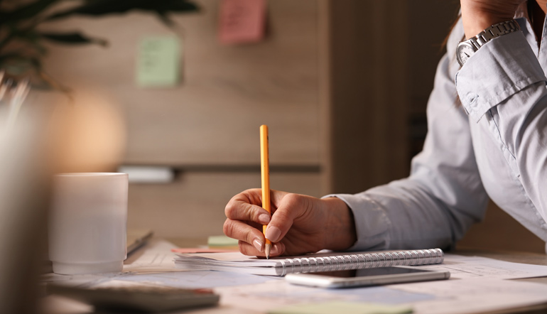 working in the office and writing business plans